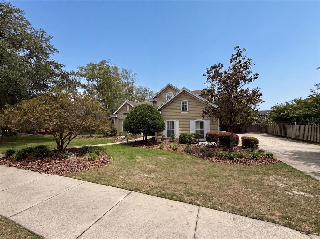 13478 Northwest 9 Road Newberry, FL 32669 - Photo 24 of 31 a view of a house with backyard and sitting area