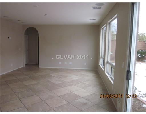 608 Delta Rio Street Las Vegas, NV 89138 - Photo 4 of 10 Den. FAMILY ROOM OFF OF KITCHEN