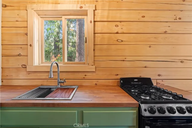 a bathroom with a sink and a window
