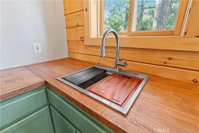 a view of a living room with a bed