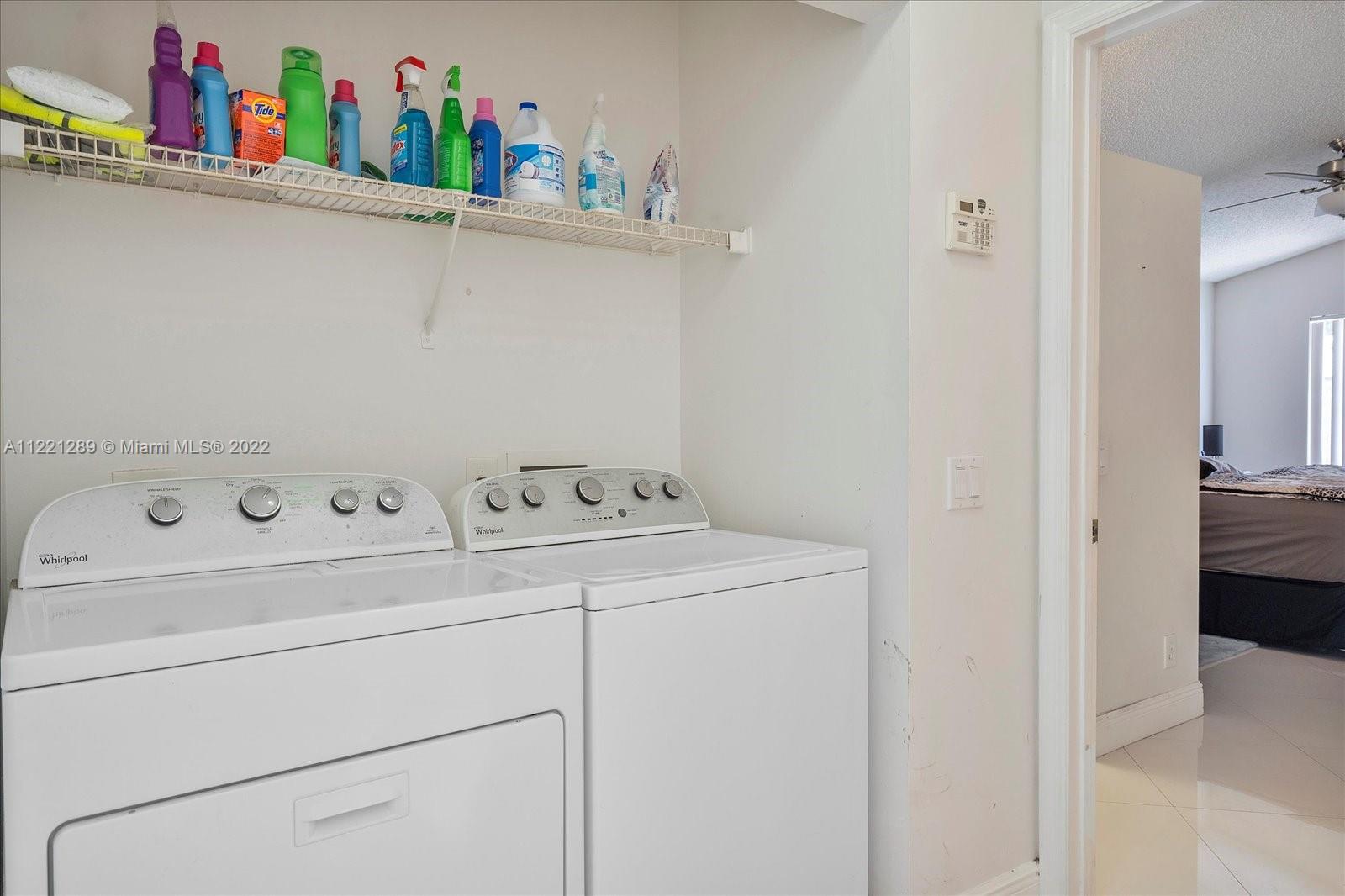 7384 Granada Way Margate, FL 33063 - Photo 26 of 30 a utility room with dryer and washer