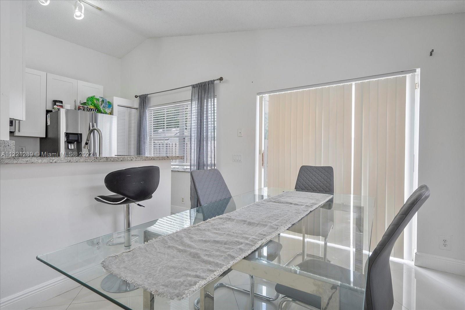 7384 Granada Way Margate, FL 33063 - Photo 9 of 30 a view of a livingroom with furniture and window