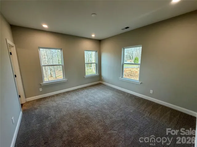 an empty room with windows