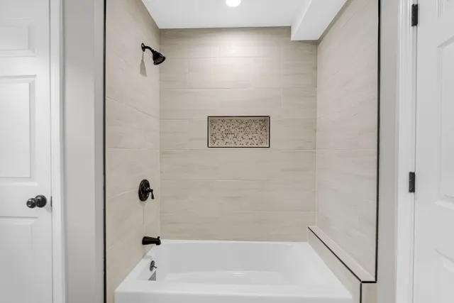 a bathroom with a bathtub