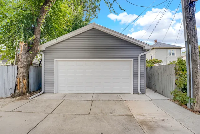 a view of backyard of house with an entryway