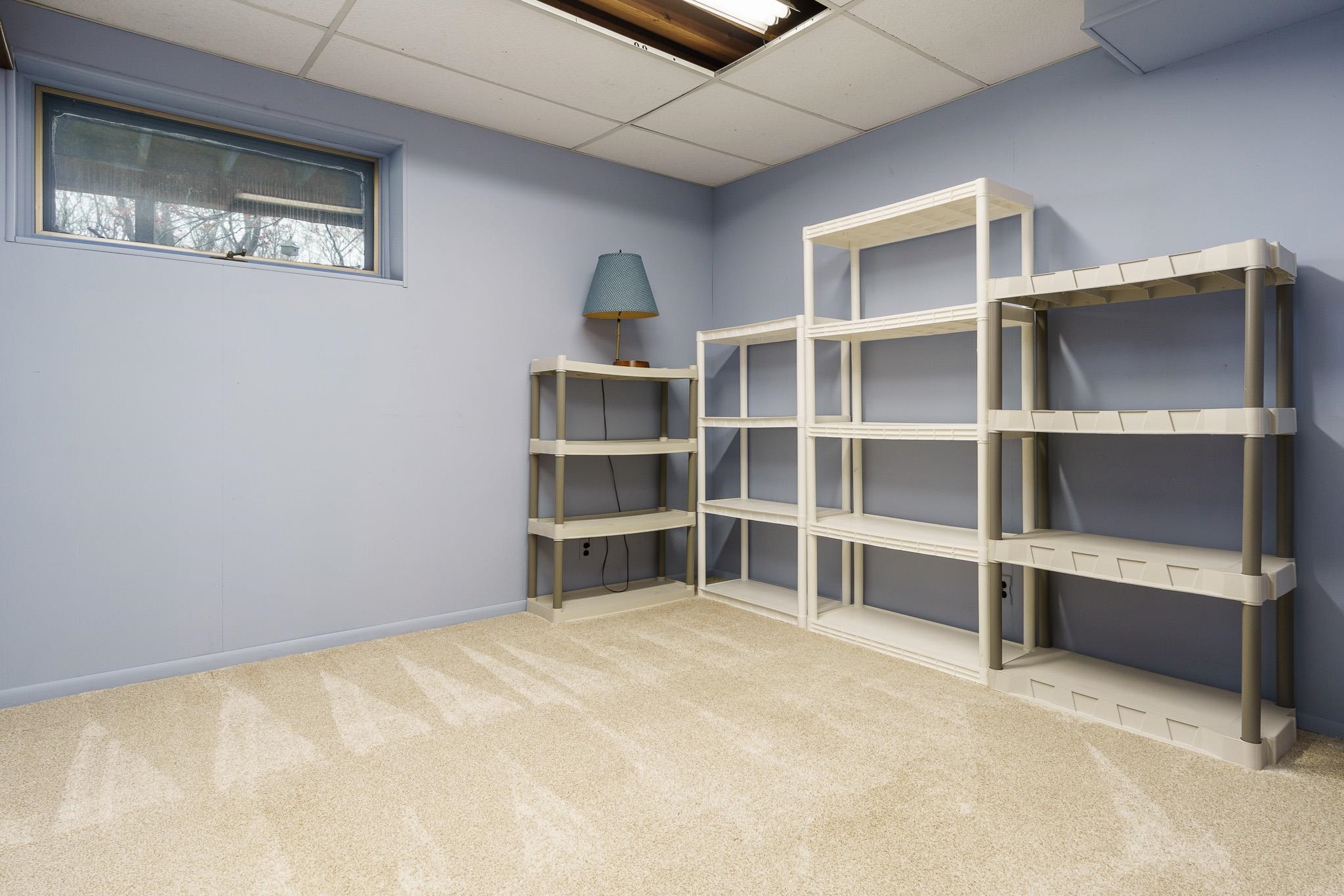 3008 West Oregon Trail Road Oregon, IL 61061 - Photo 31 of 48 a view of an empty room with empty shelves