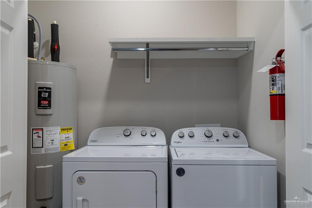 1005 West Kohala Avenue, Unit 4 Alton, TX 78573 - Photo 16 of 21 a utility room with dryer and washer
