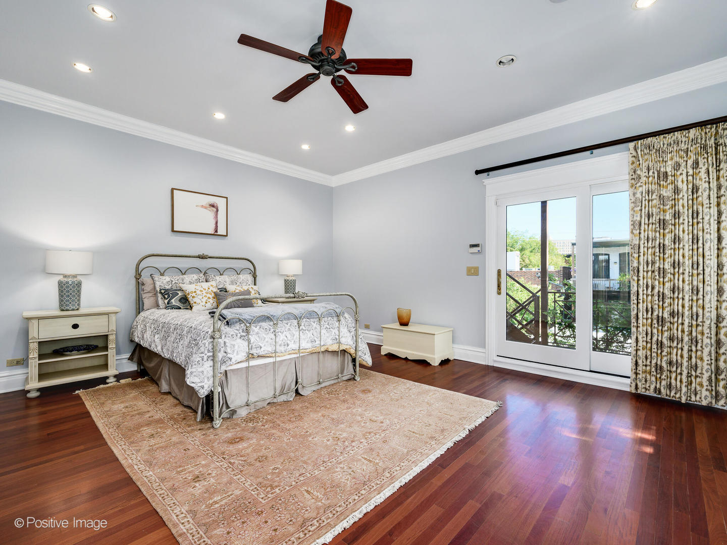 2019 North Mohawk Street, Unit 3 Chicago, IL 60614 - Photo 18 of 27 a bedroom with a bed and wooden floor