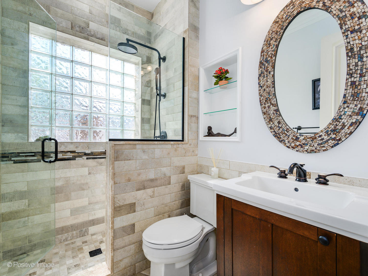 2019 North Mohawk Street, Unit 3 Chicago, IL 60614 - Photo 19 of 27 a bathroom with a sink and a mirror