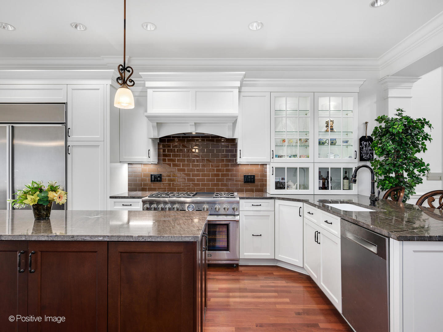 2019 North Mohawk Street, Unit 3 Chicago, IL 60614 - Photo 5 of 27 a kitchen with a sink stove and cabinets