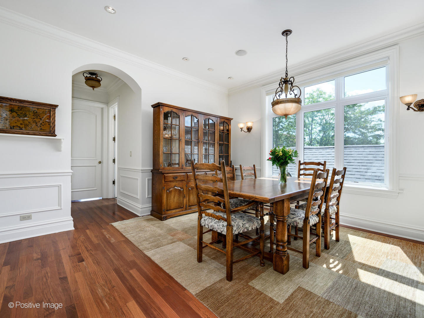 2019 North Mohawk Street, Unit 3 Chicago, IL 60614 - Photo 9 of 27 a view of a dining room with furniture window and wooden floor