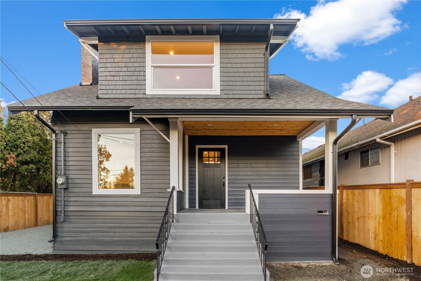 a front view of a house with garage