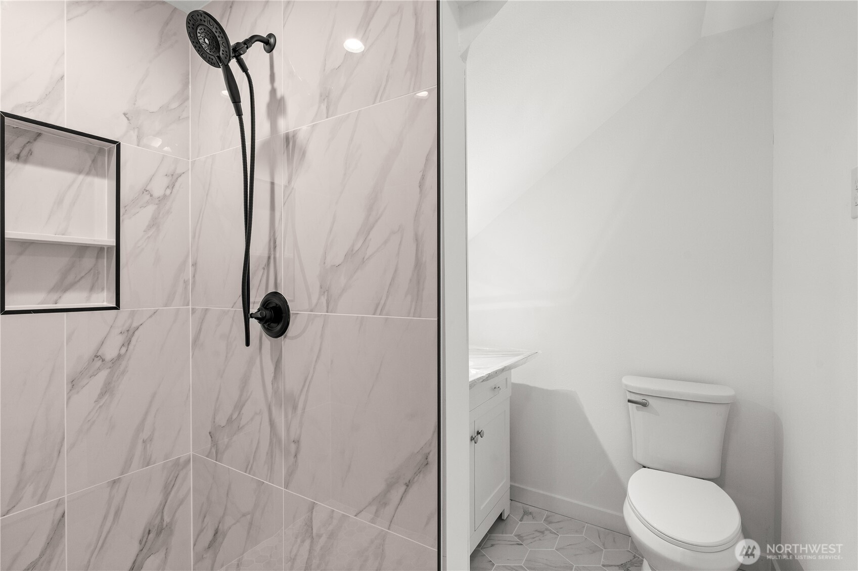 4706 Southwest Eddy Street Seattle, WA 98136 - Photo 15 of 27 a white toilet sitting next to a shower