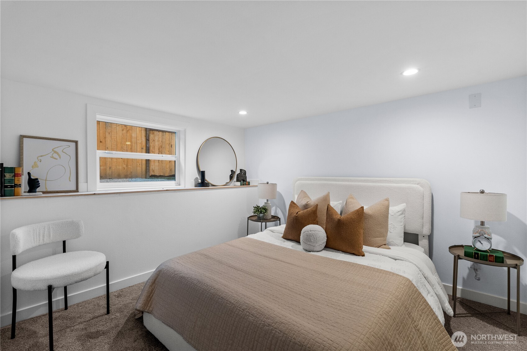 4706 Southwest Eddy Street Seattle, WA 98136 - Photo 16 of 27 a bedroom with bed and a window