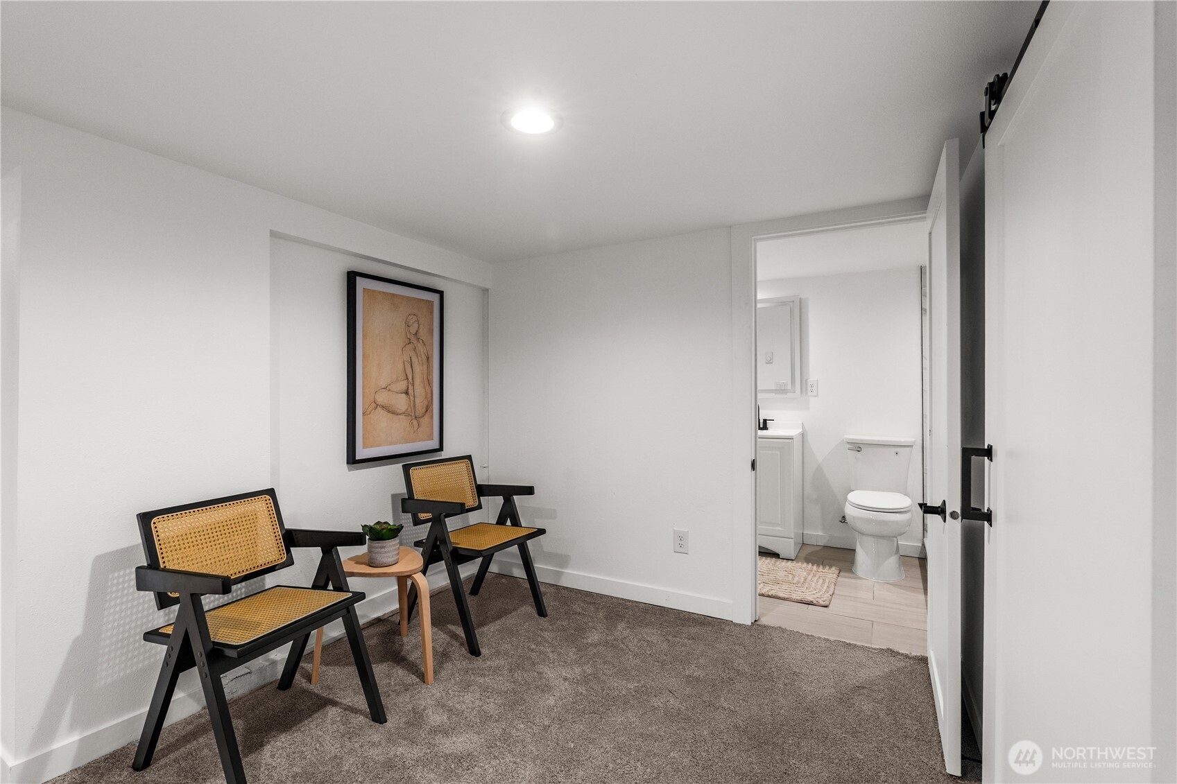 4706 Southwest Eddy Street Seattle, WA 98136 - Photo 20 of 27 a view of a room with lounge chair and a workspace