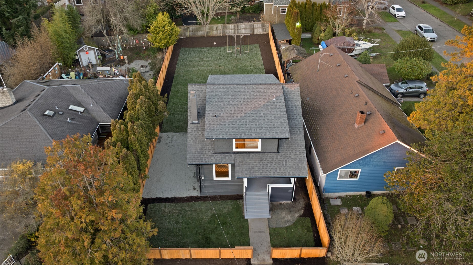 4706 Southwest Eddy Street Seattle, WA 98136 - Photo 24 of 27 an aerial view of a house with a yard