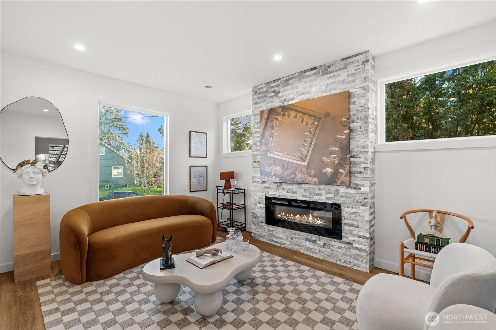 4706 Southwest Eddy Street Seattle, WA 98136 - Photo 5 of 27 a living room with furniture fireplace and window
