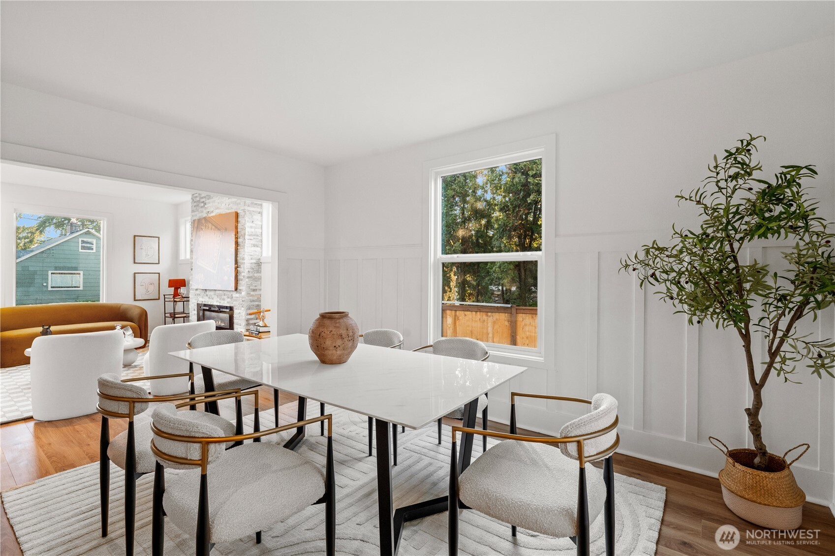 4706 Southwest Eddy Street Seattle, WA 98136 - Photo 8 of 27 a view of a dining room with furniture window and outside view