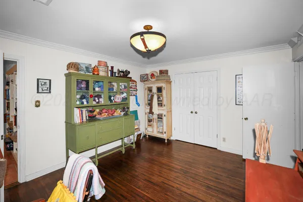 a room with furniture and a window