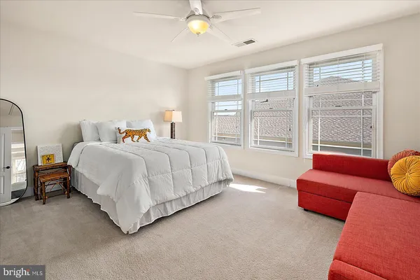 a view of a swimming pool with a yard