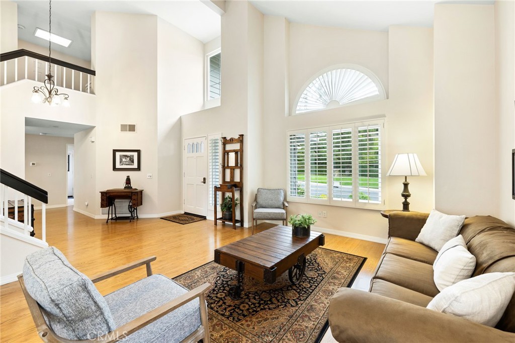 855 Ave Bernardo San Dimas, CA 91773 - Photo 13 of 65 a living room with furniture a table and a large window