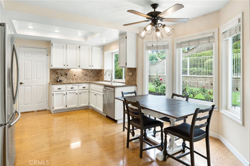 855 Ave Bernardo San Dimas, CA 91773 - Photo 24 of 65 Kitchen with the breakfast nook in view that overlooks the backyard.