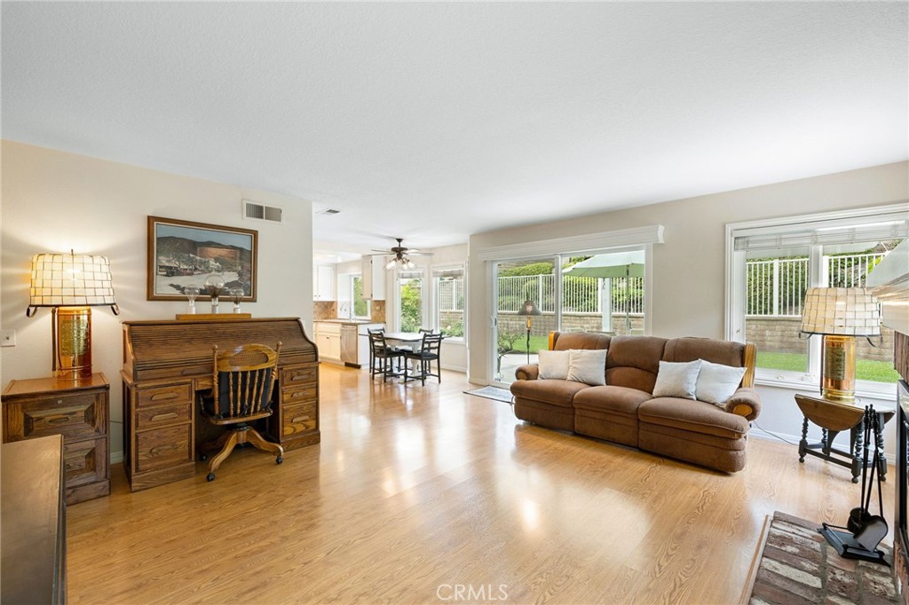 855 Ave Bernardo San Dimas, CA 91773 - Photo 28 of 65 a living room with furniture and a table with wooden floor