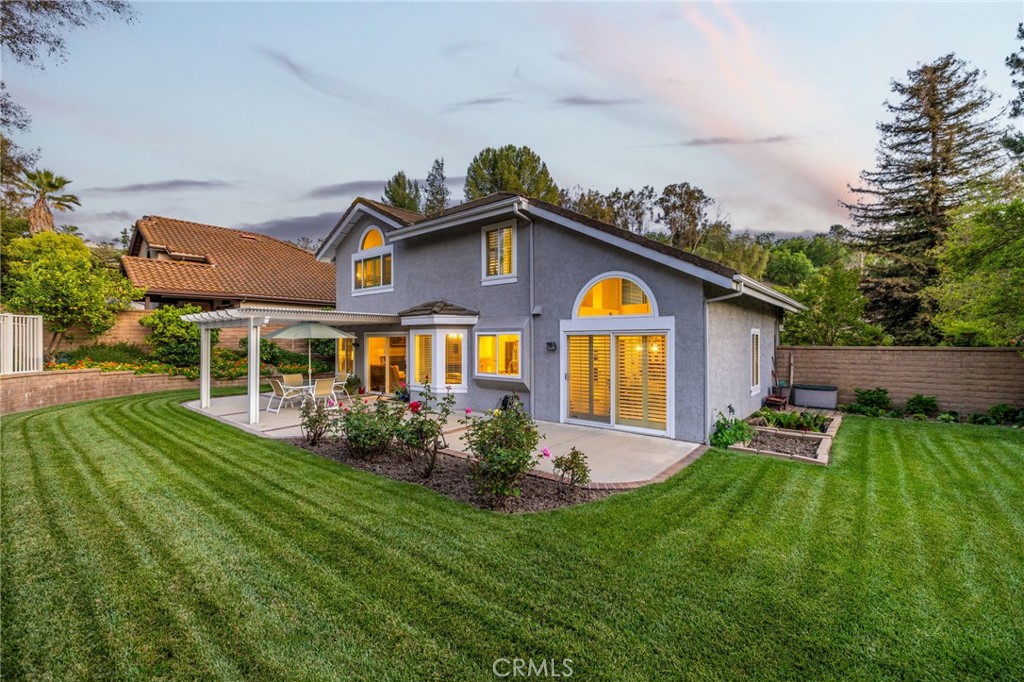 855 Ave Bernardo San Dimas, CA 91773 - Photo 3 of 65 a front view of house with yard and green space