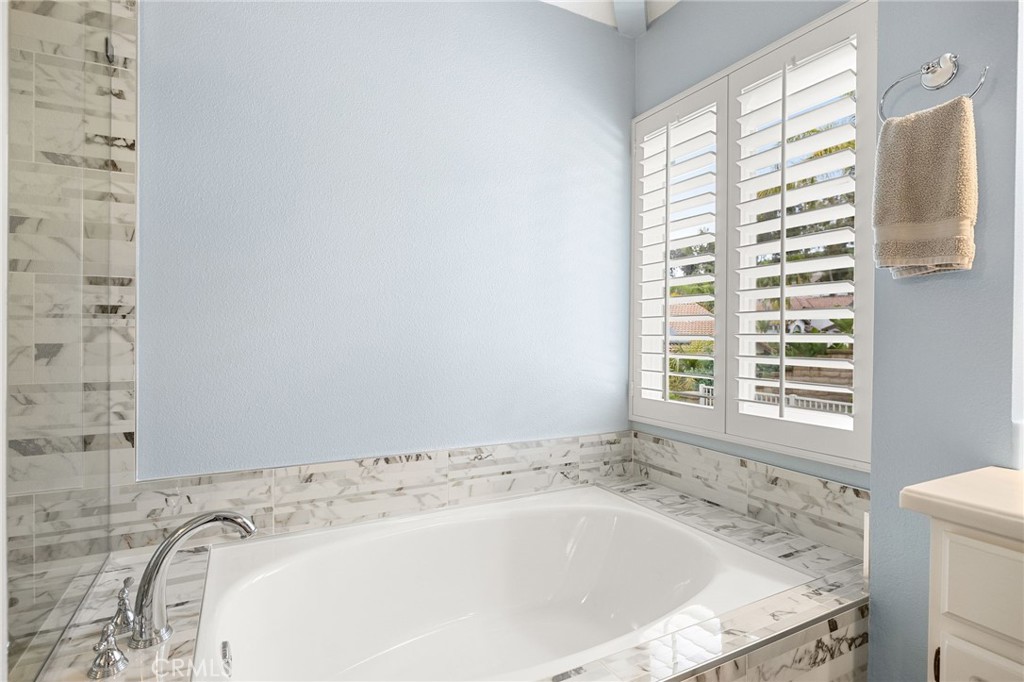 855 Ave Bernardo San Dimas, CA 91773 - Photo 38 of 65 a bath tub sitting in a bathroom next to a window