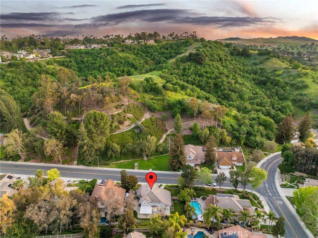 855 Ave Bernardo San Dimas, CA 91773 - Photo 58 of 65 Drone photo from the backyard showing the green belt across the street.