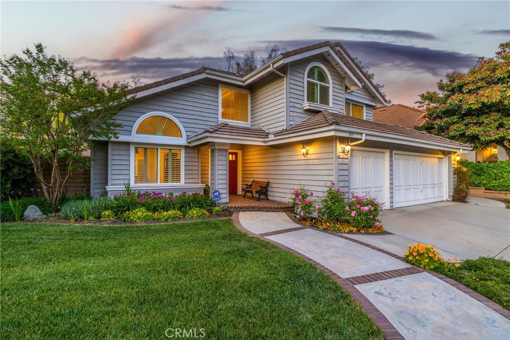 855 Ave Bernardo San Dimas, CA 91773 - Photo 60 of 65 a front view of a house with a garden and plants
