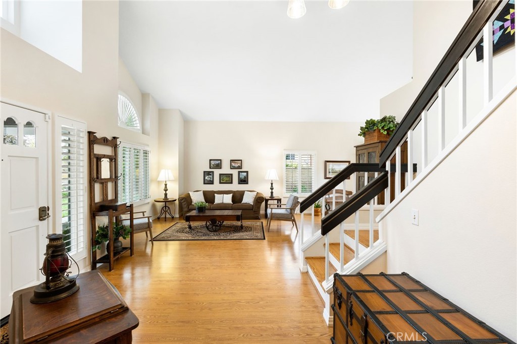 855 Ave Bernardo San Dimas, CA 91773 - Photo 8 of 65 a living room with lots of furniture and floor to ceiling windows