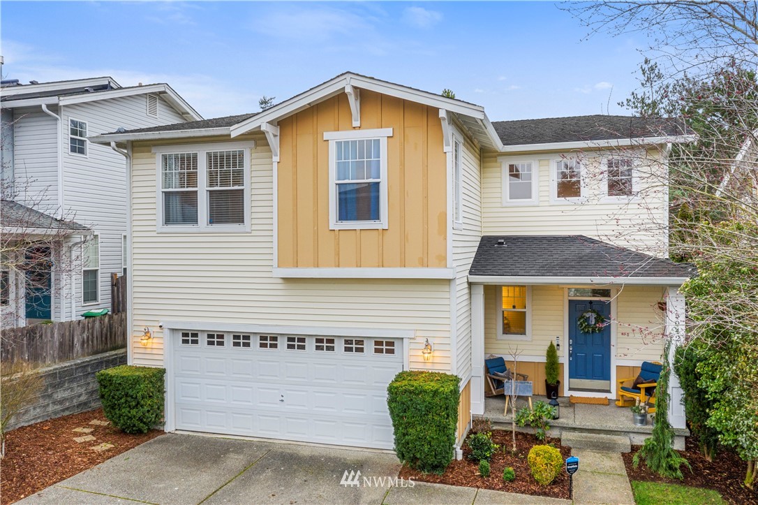 5042 Northeast 4th Place Renton, WA 98059 - Photo 1 of 29 a front view of a house with garden