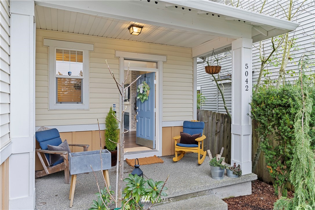 5042 Northeast 4th Place Renton, WA 98059 - Photo 2 of 29 a backyard of a house with outdoor seating