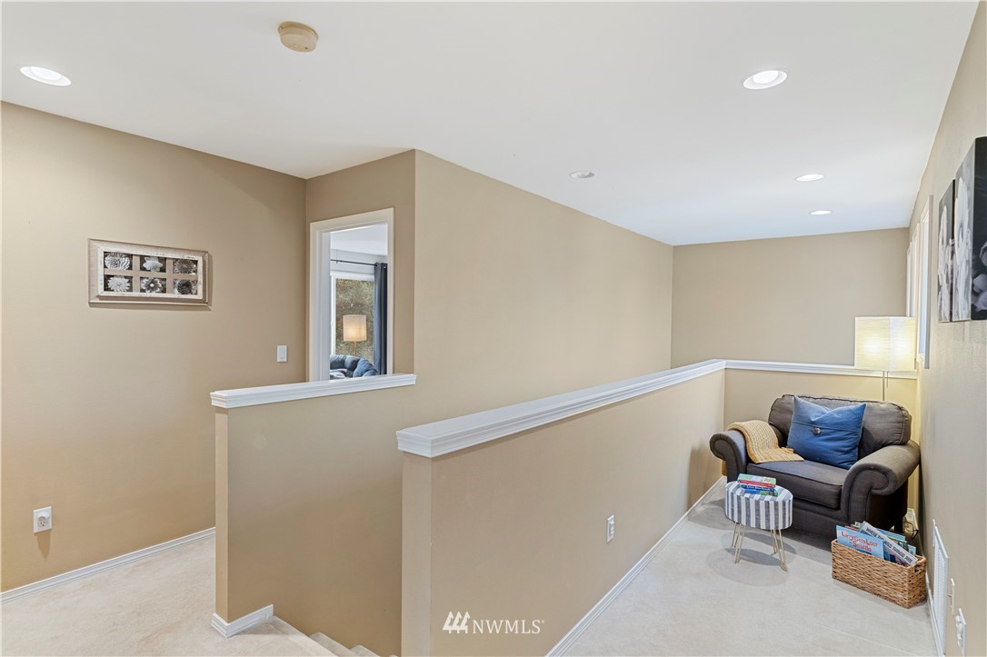 5042 Northeast 4th Place Renton, WA 98059 - Photo 11 of 29 a living room with furniture and a window