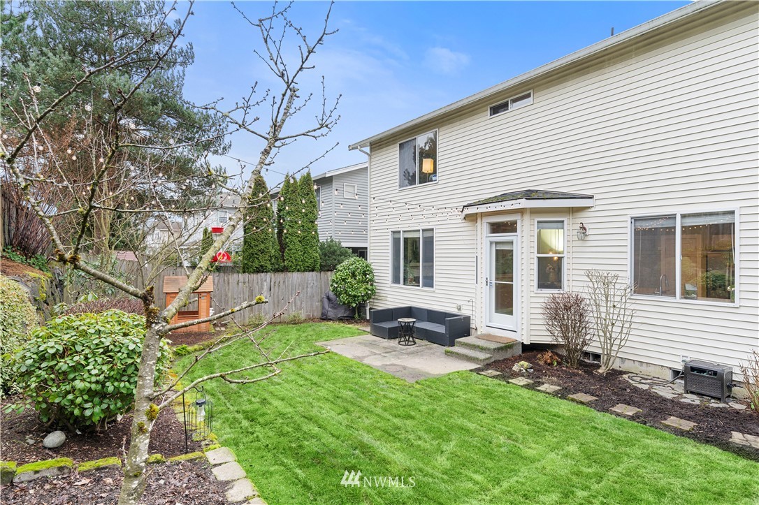 5042 Northeast 4th Place Renton, WA 98059 - Photo 24 of 29 a view of a house with a yard and sitting area