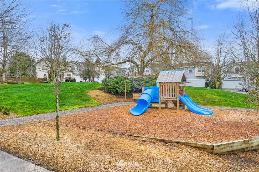 5042 Northeast 4th Place Renton, WA 98059 - Photo 26 of 29 a view of a park with slide