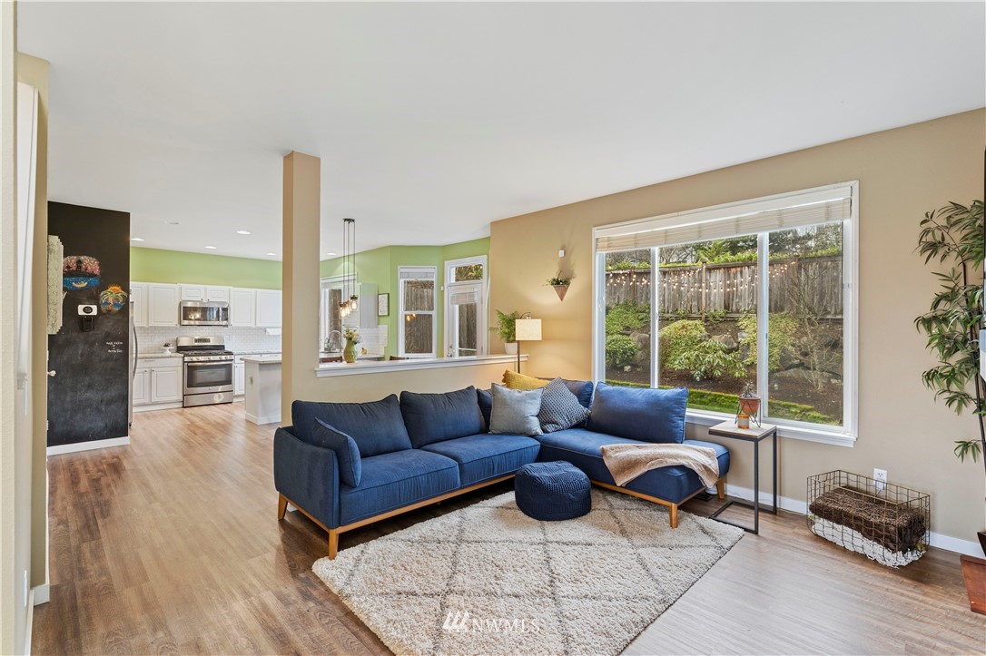 5042 Northeast 4th Place Renton, WA 98059 - Photo 5 of 29 a living room with furniture and a large window