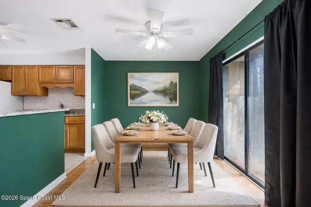 a bedroom with a large bed and a dresser