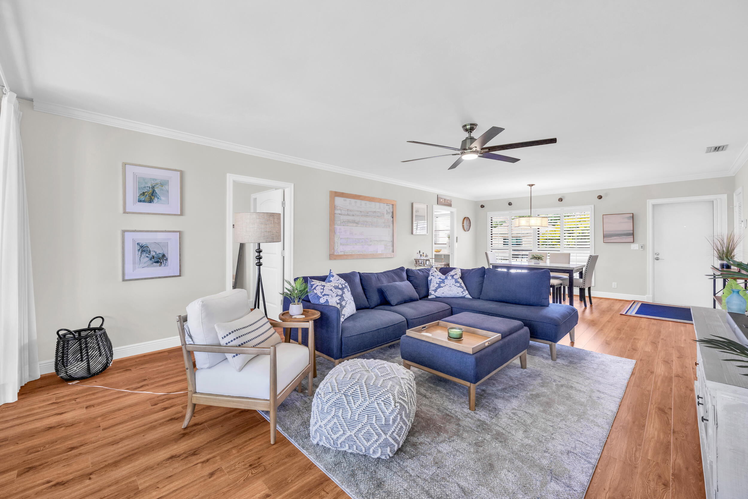 8 Southeast Turtle Creek Drive, Unit D Jupiter, FL 33469 - Photo 3 of 33 a living room with furniture and a wooden floor