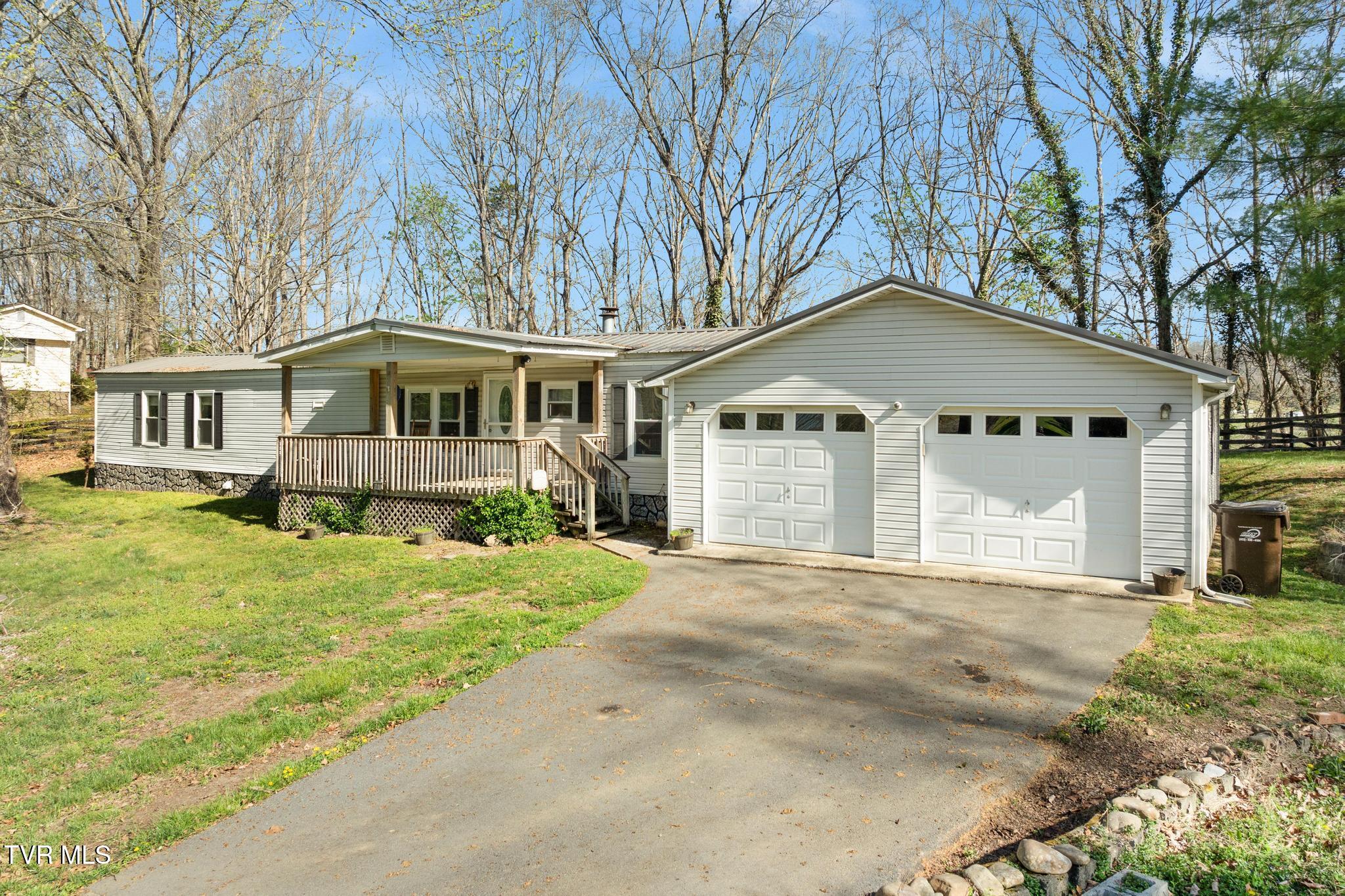 717 White Top Road Bluff City, TN 37618 - Photo 3 of 30 Side view