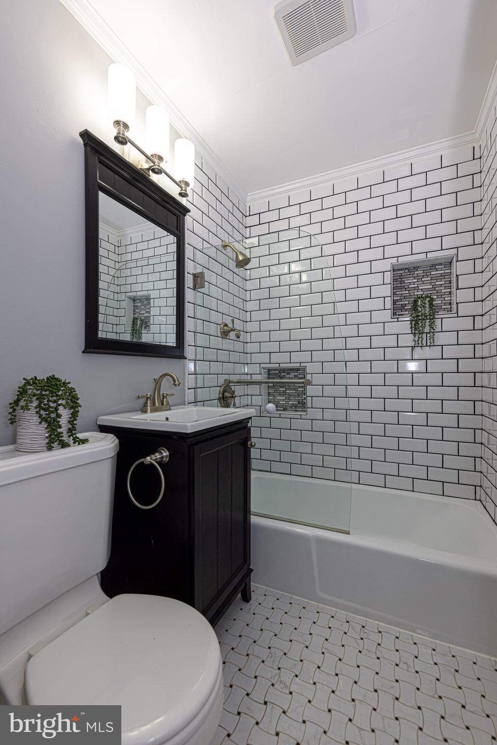6404 Rivington Road Springfield, VA 22152 - Photo 16 of 49 Stunning hall bathroom loaded with updates!