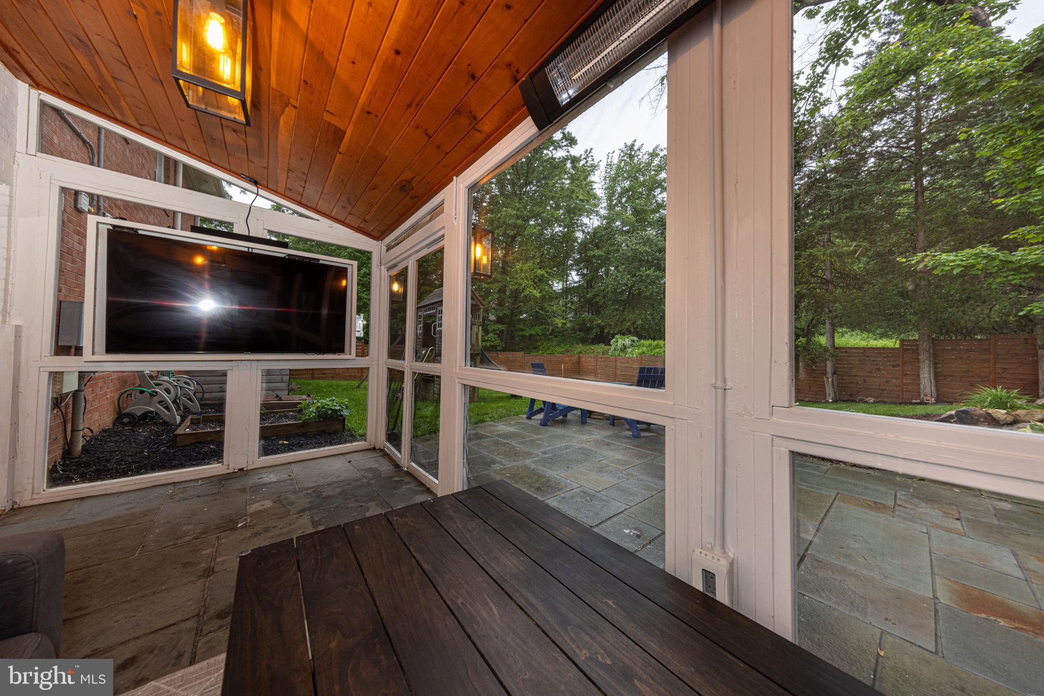 6404 Rivington Road Springfield, VA 22152 - Photo 35 of 49 Showcasing the 60" Articulating exterior TV