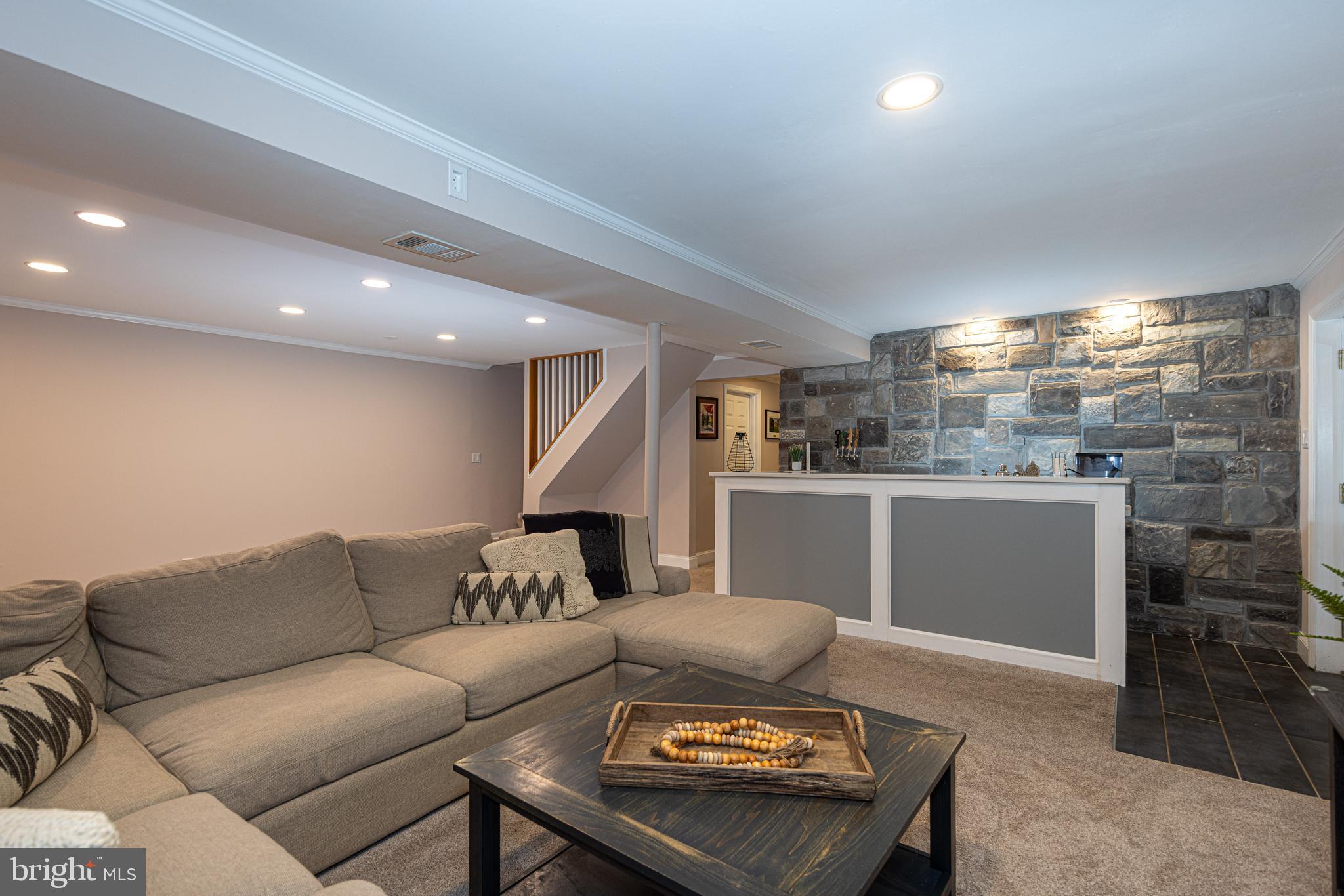 Custom stone wall in this Entertainer's Paradise