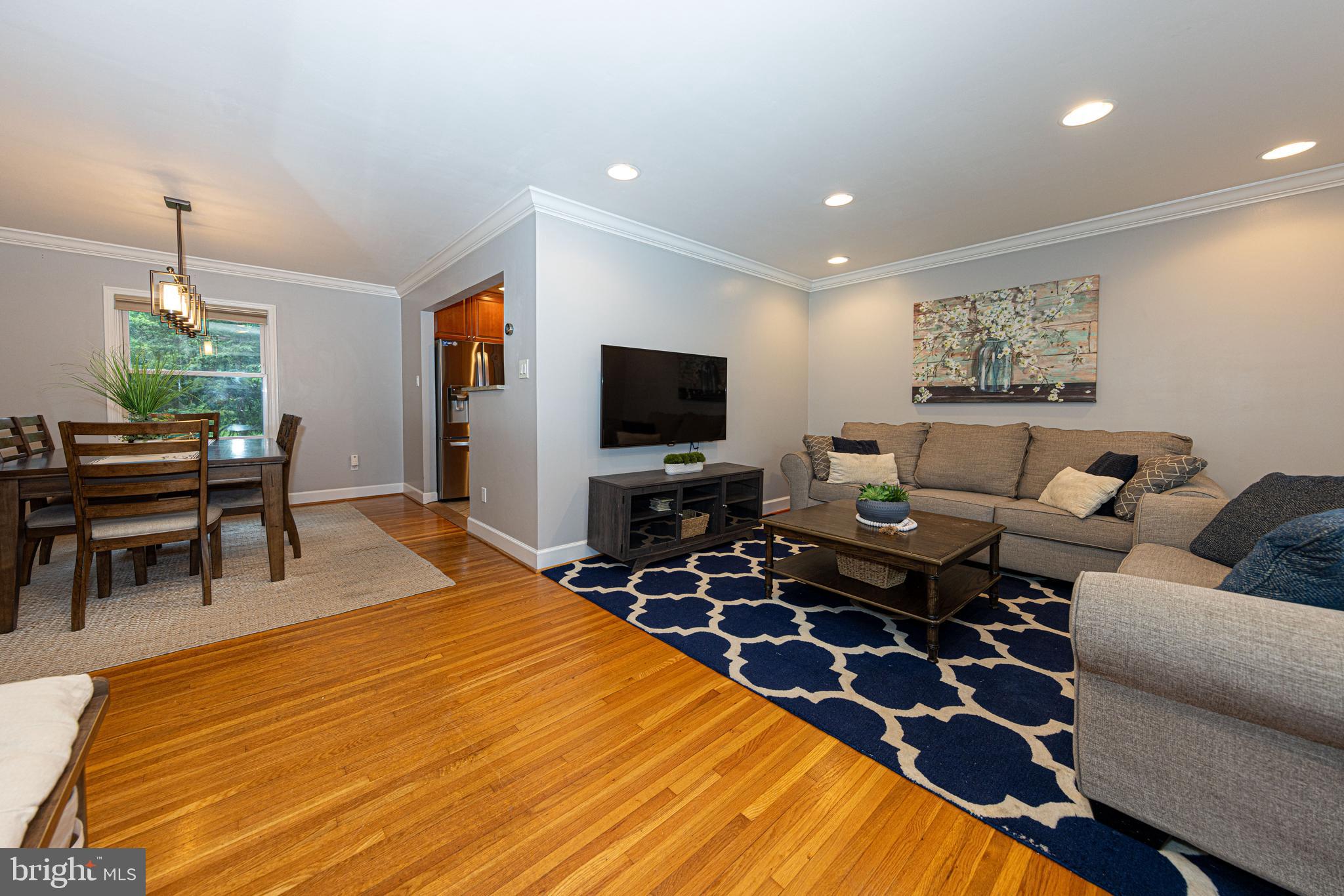 Welcome Home to gleaming hardwood floors
