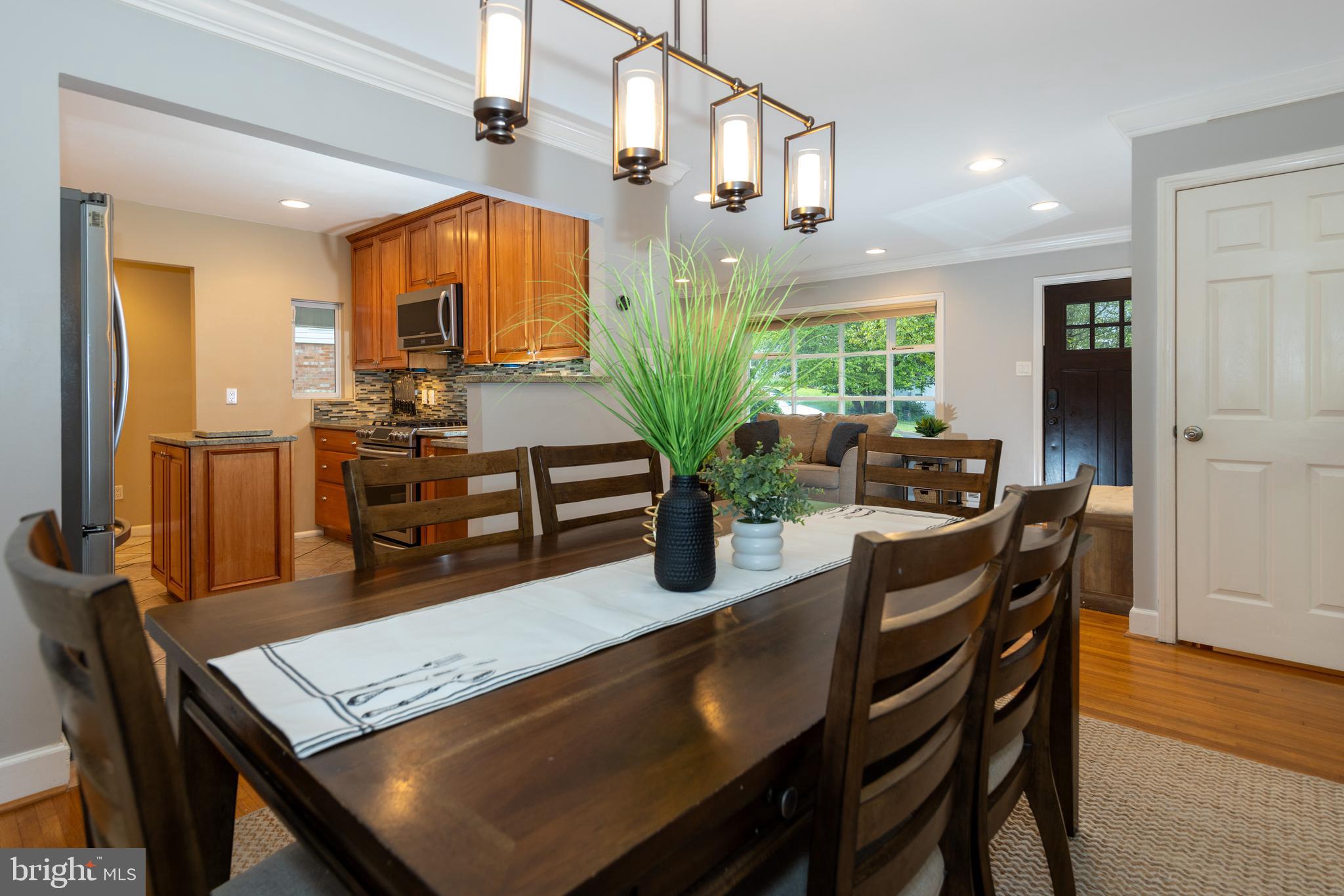 6404 Rivington Road Springfield, VA 22152 - Photo 9 of 49 Bright dining room with an on-point light fixture
