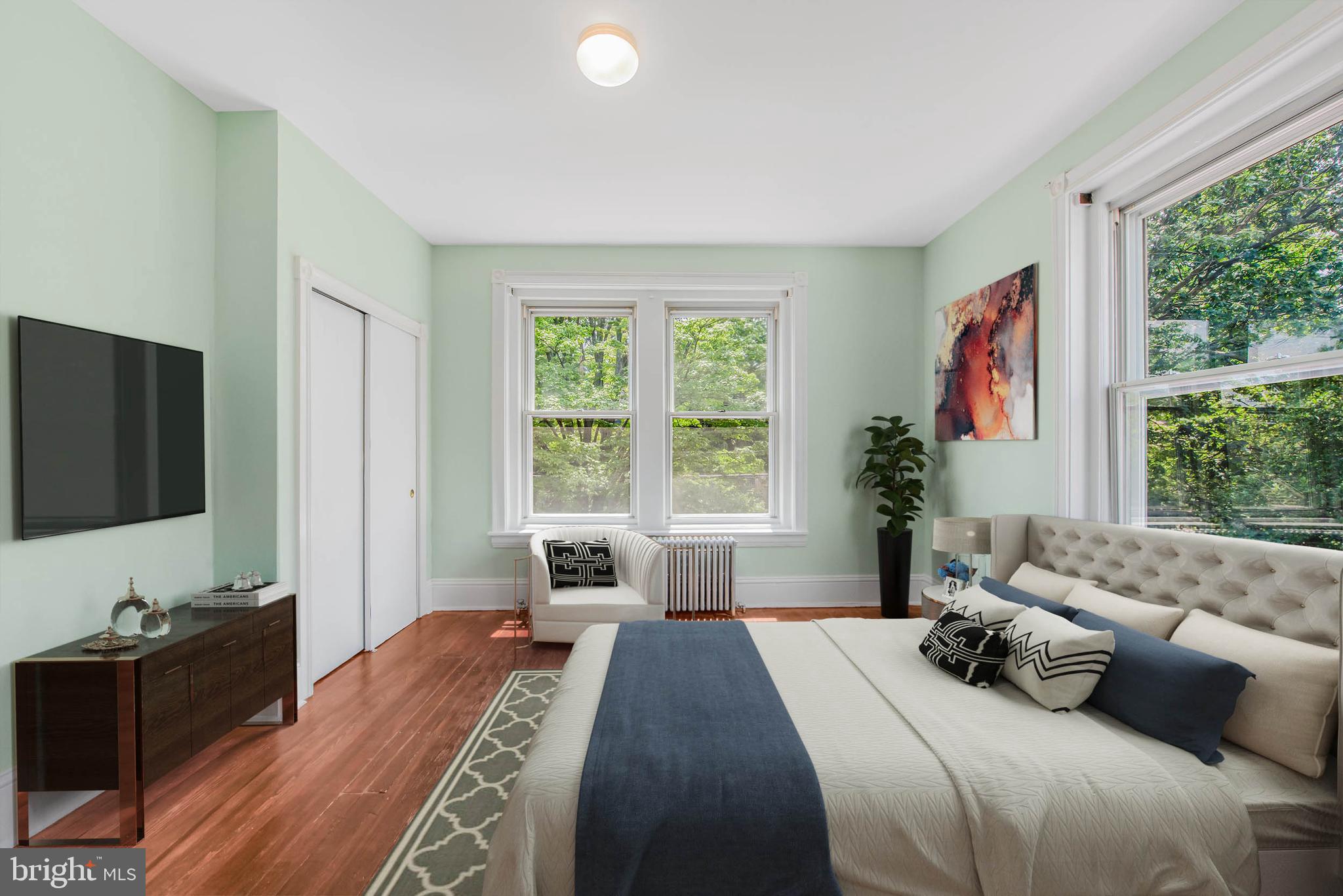 14 Simpson Road Ardmore, PA 19003 - Photo 33 of 58 a bedroom with a bed and a flat screen tv