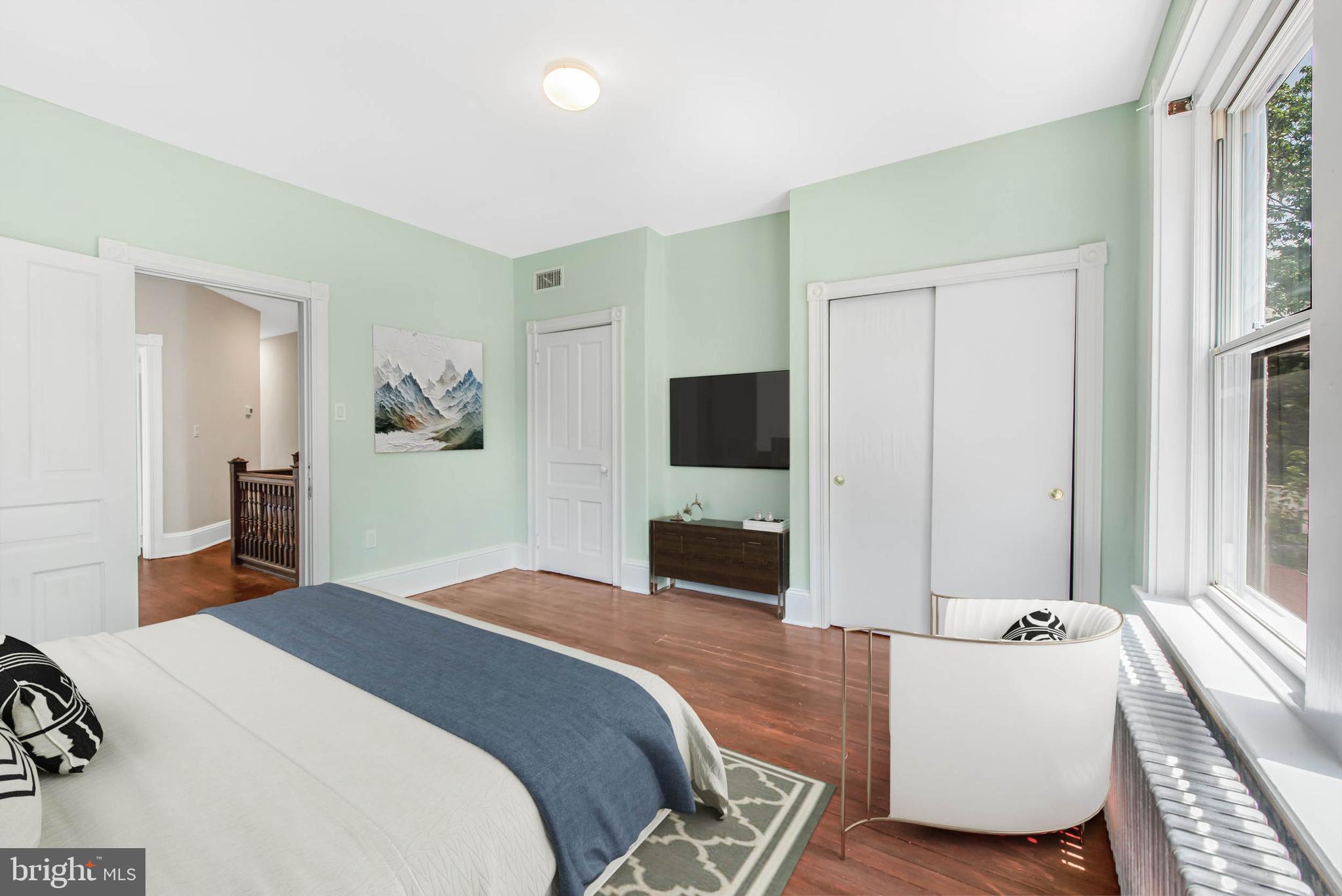 14 Simpson Road Ardmore, PA 19003 - Photo 34 of 58 a bedroom with a bed and a flat screen tv