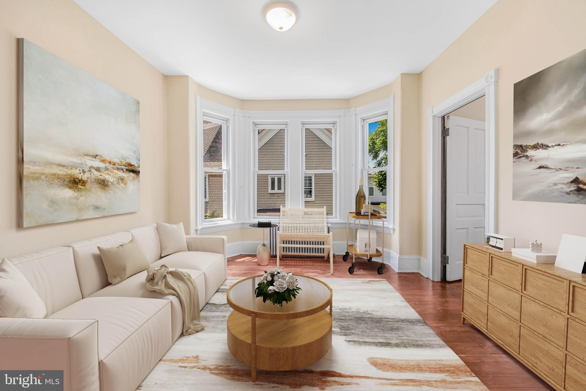 14 Simpson Road Ardmore, PA 19003 - Photo 37 of 58 a living room with furniture and a potted plant