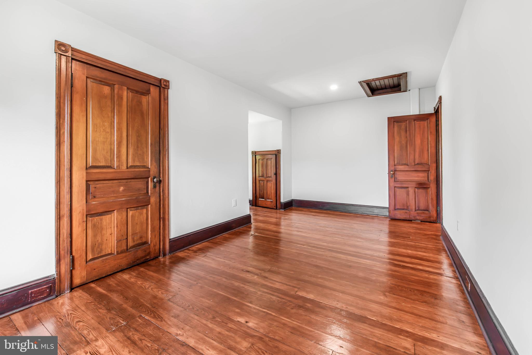 14 Simpson Road Ardmore, PA 19003 - Photo 40 of 58 an empty room with wooden floor and closet